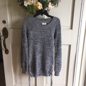 Gray sweater, ties at bottom